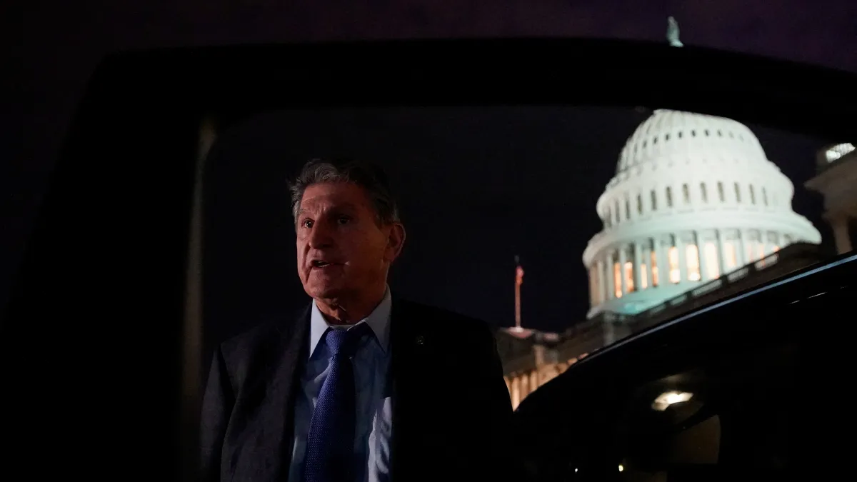 U.S. Senator Joe Manchin (D-WV) talks to reporters as he leaves the U.S. Capitol in Washington