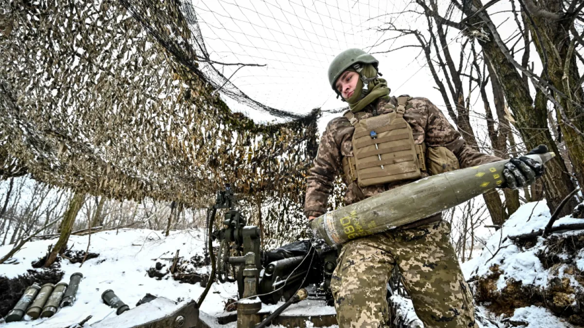 Soldier in Ukraine loading an American-made M777 howitzer Soldier in Ukraine loading an American-made M777 howitzer