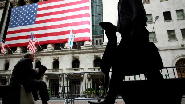 FILE PHOTO -  Morning commuters are seen outside the New York Stock Exchange