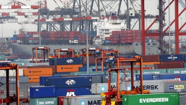 Ships and containers are seen at the Port Newark Container Terminal near New York City in Newark, New Jersey in this picture taken July 2, 2009.  REUTERS/Mike Segar     