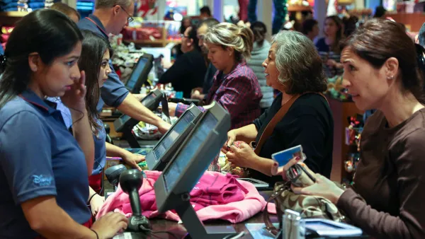 Black Friday customers make purchases at a Disney store at the Glendale Galleria in Glendale, California