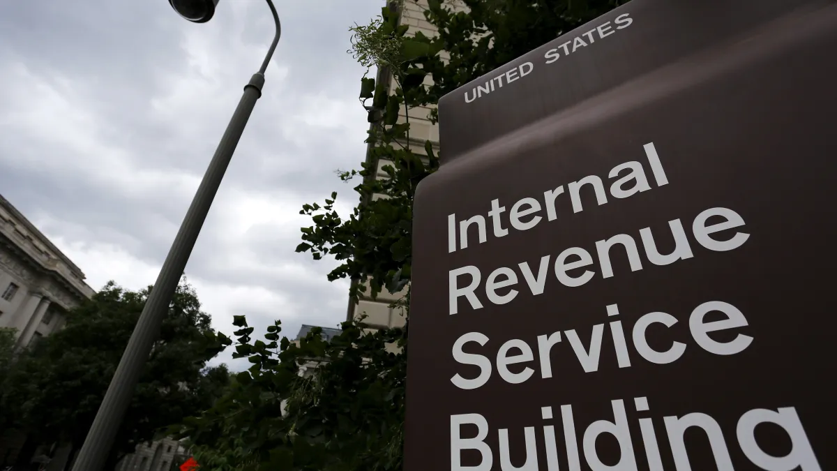A security camera hangs near a corner of the Internal Revenue Service (IRS) building in Washington