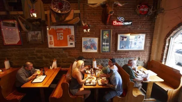 Patrons dine at the Jack's Barbecue restaurant in downtown Nashville, Tennessee June 19, 2013.  REUTERS/Harrison McClary 