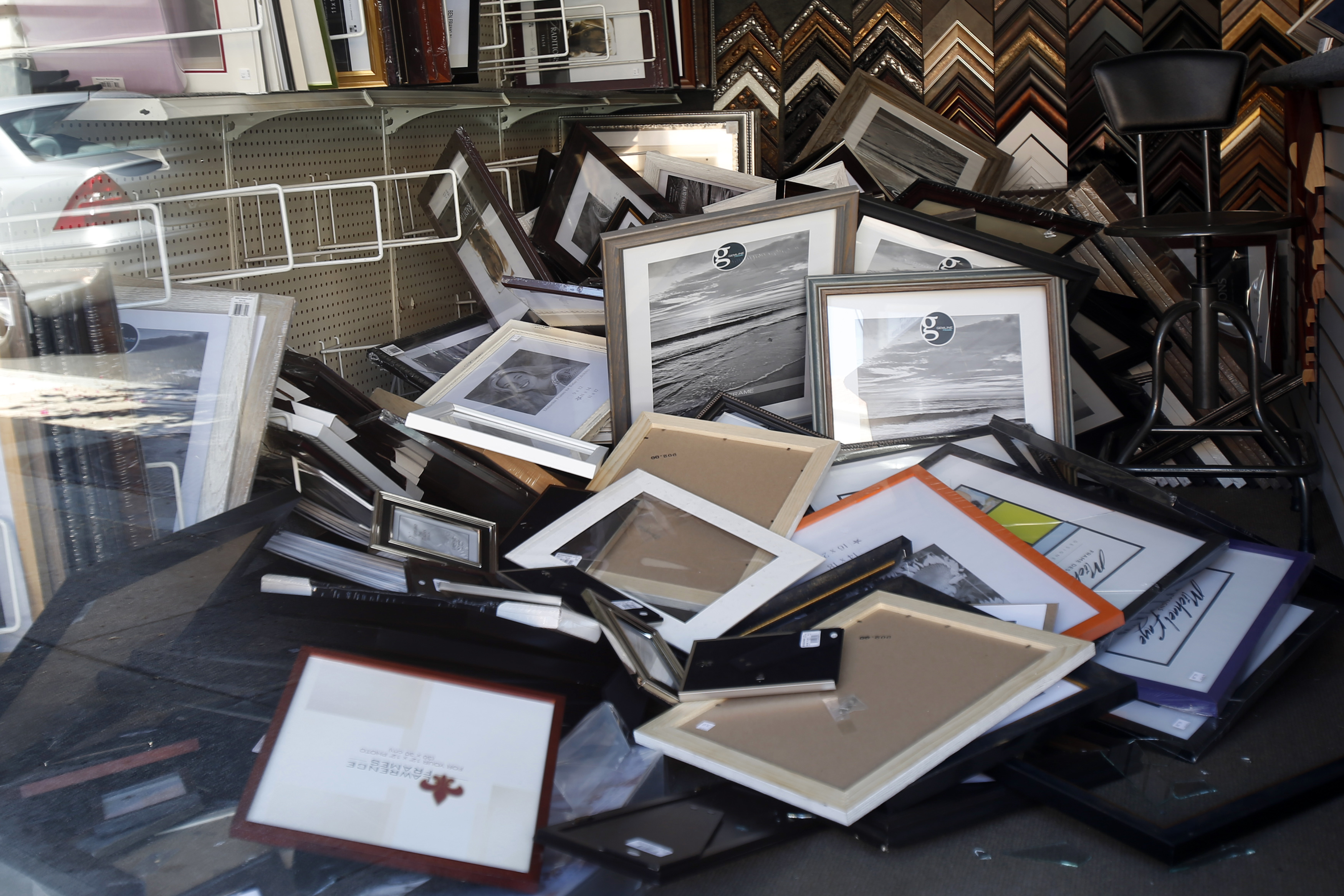 Fallen picture frames are seen inside a store after an earthquake in Napa, California