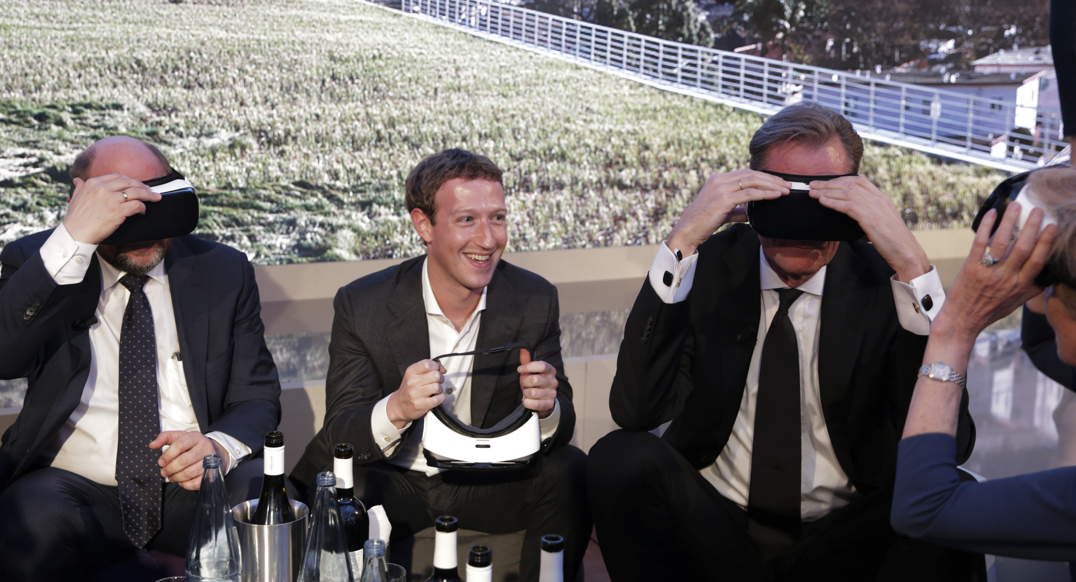 Schulz, President of the European Parliament, Facebook CEO Zuckerberg, Doepfner, CEO of Axel Springer SE and publisher Springer try Gear VR virtual reality headsets during the awards ceremony of the newly established Axel Springer Award in Berlin