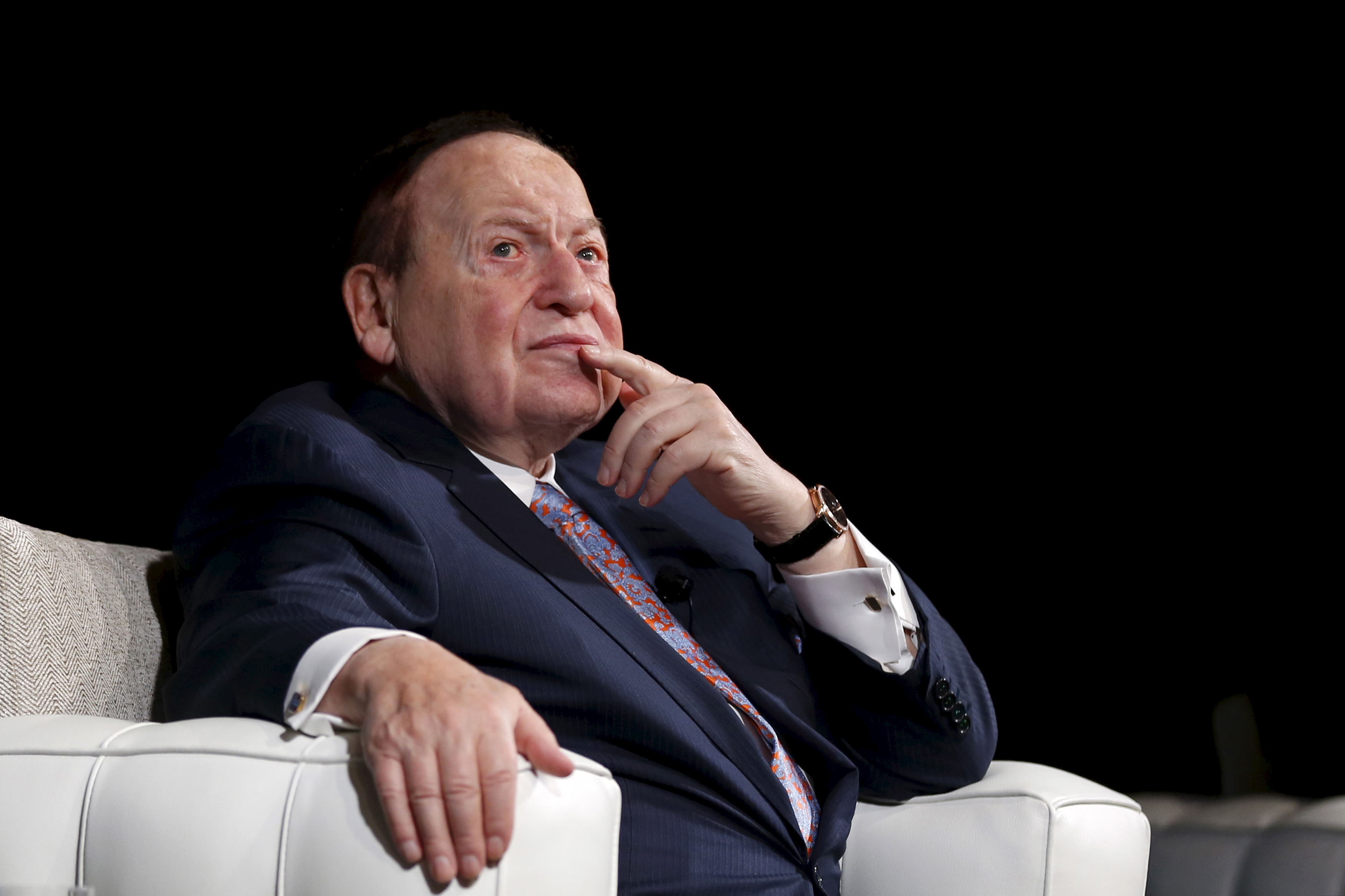 Gambling giant Las Vegas Sands Corp's Chief Executive Sheldon Adelson reacts during a news conference in Macau, China 