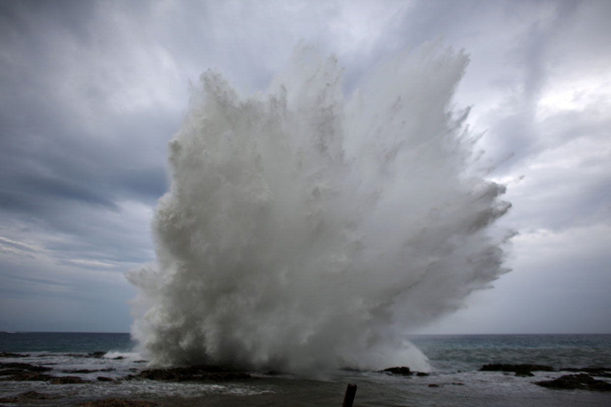 A wave splashes on the beach at Siboney ahead of the arrival of Hurricane Matthew, Cuba