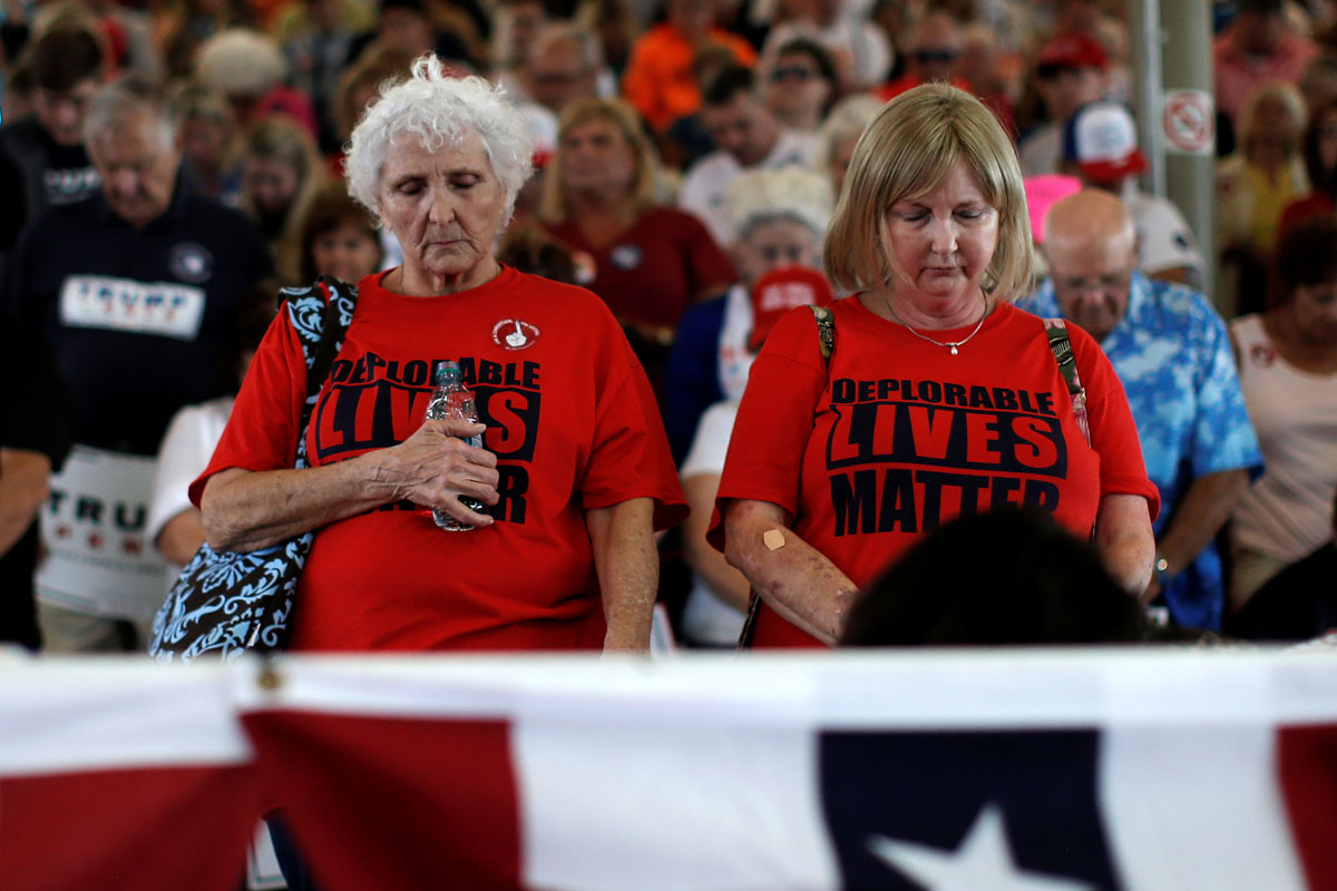 Supporters of Republican U.S. presidential nominee Donald Trump attend a campaign rally in Ocala