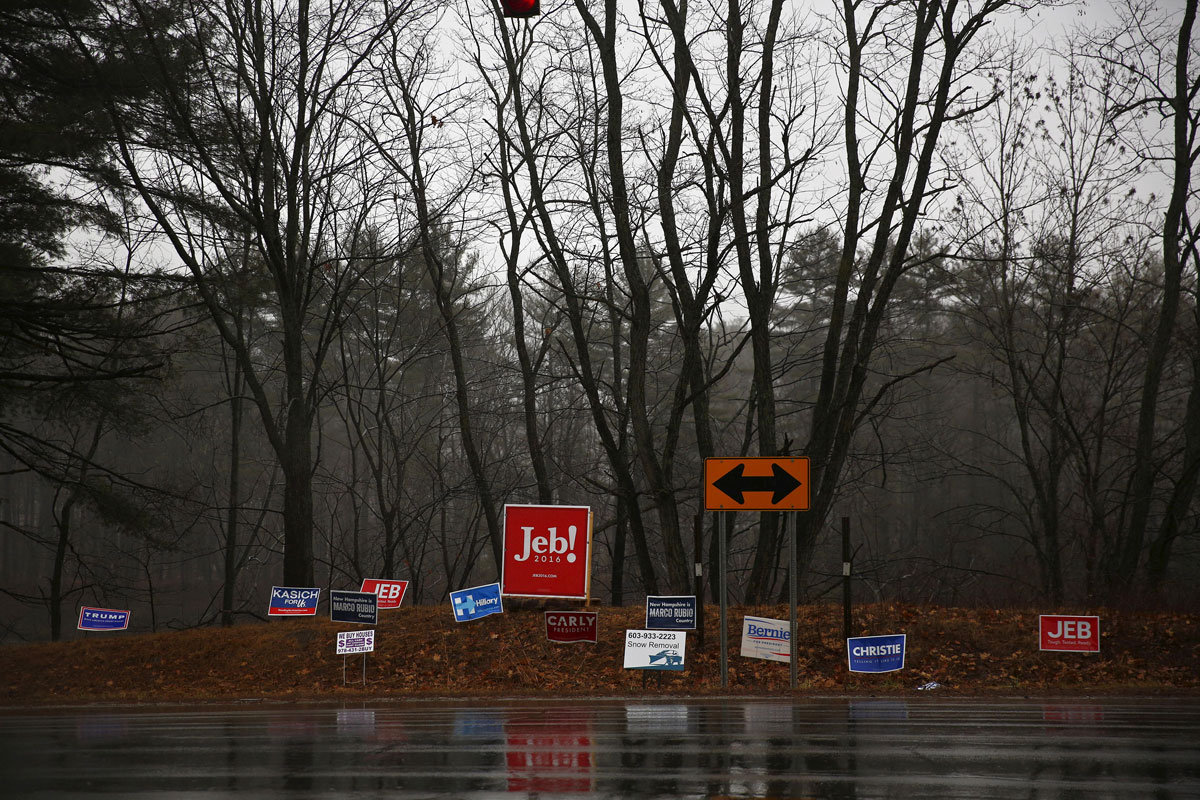 Campaign signs are seen near where U.S. Republican presidential candidate Ted Cruz attends a campaign event in Hooksett