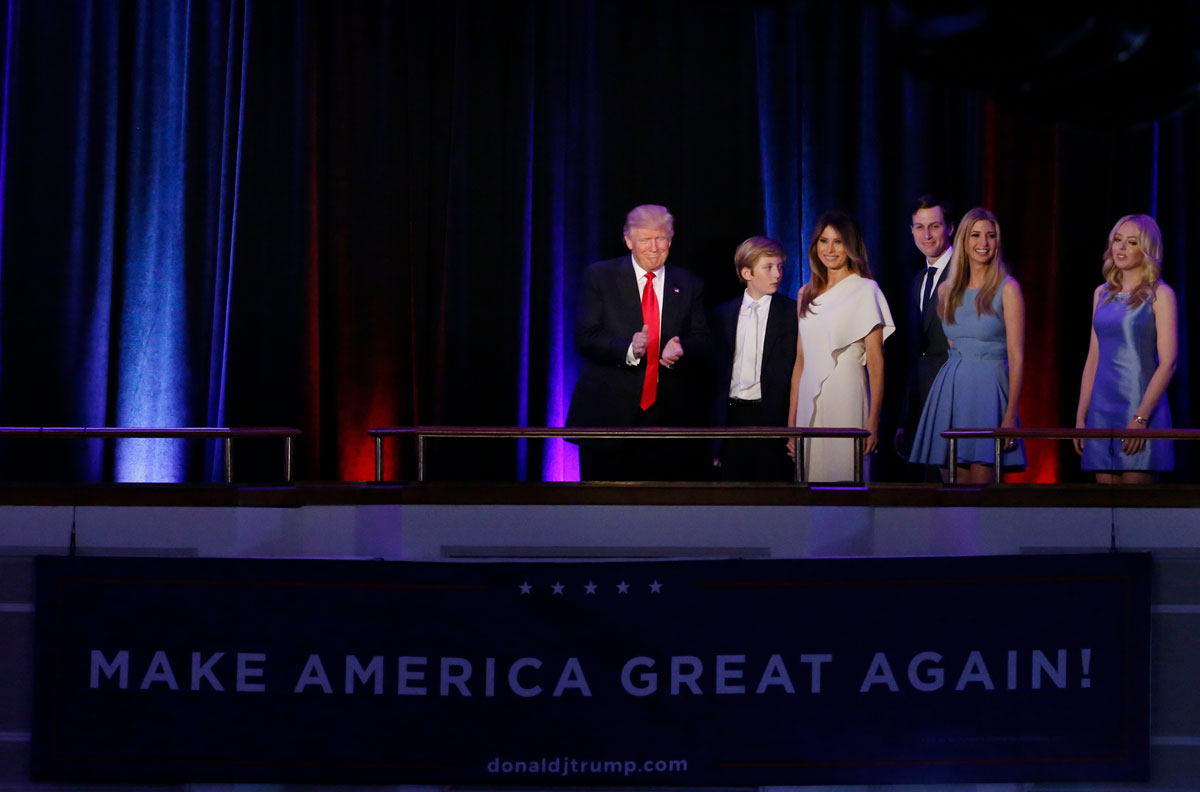 Republican U.S. presidential nominee Donald Trump is accompanied by members of his family as he arrives to address supporters at his election night rally in New York