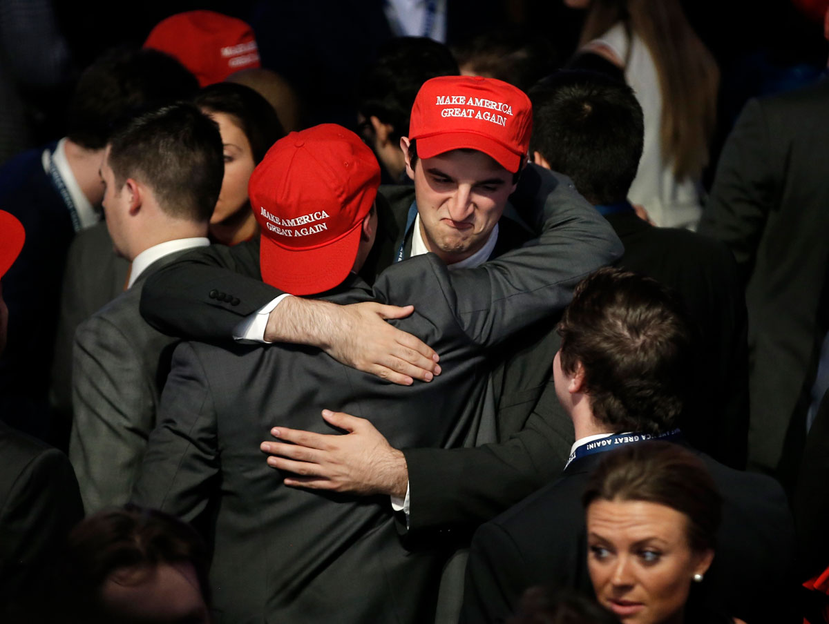 Trump supporters embrace as they watch election returns come in at Republican U.S. presidential nominee Donald Trump's election night rally in New York