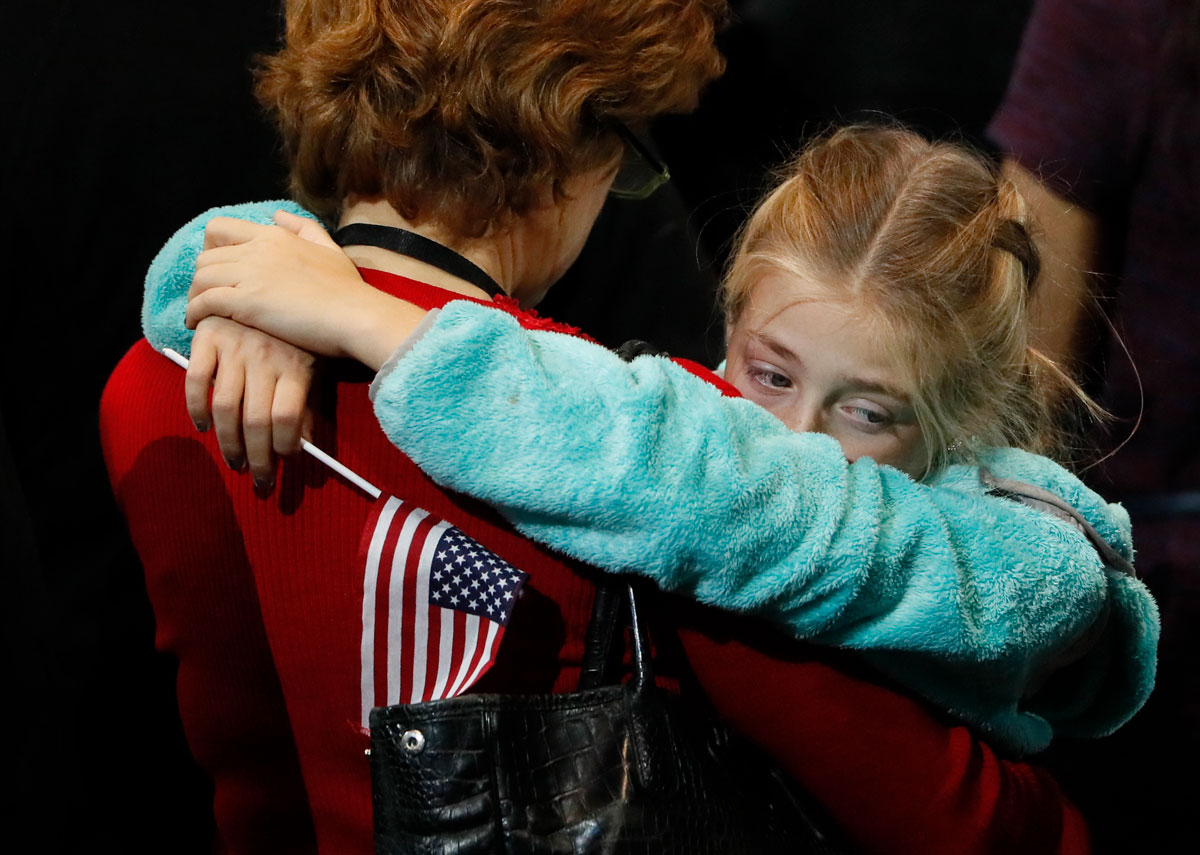 Supporters of U.S. Democratic presidential nominee Hillary Clinton react at her election night rally in Manhattan