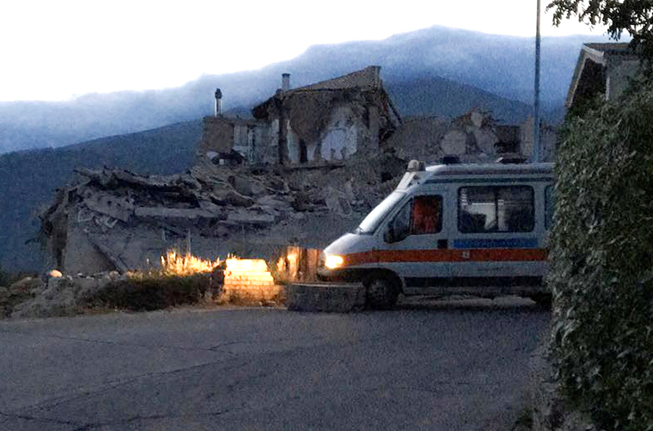 A destroyed house is seen following a quake in Amatrice