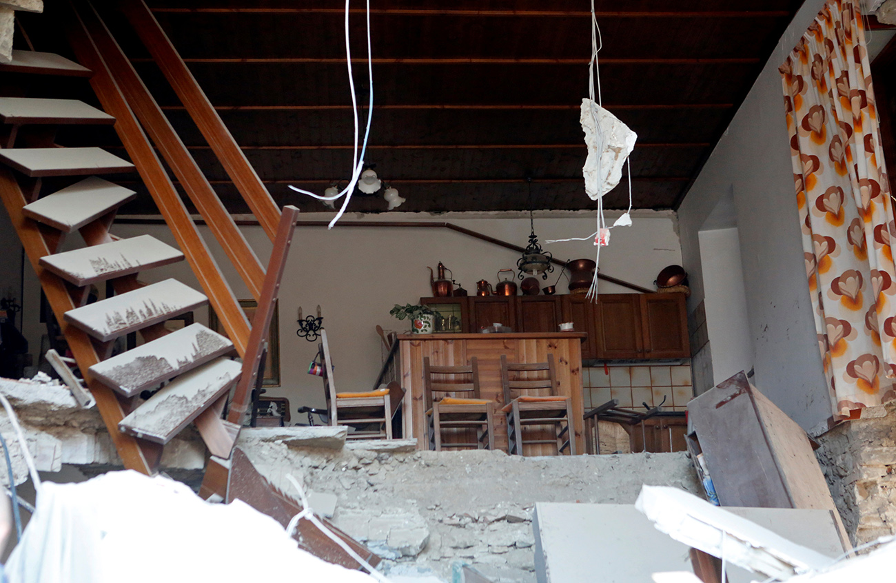 The interior of a house is seen following a quake in Amatrice