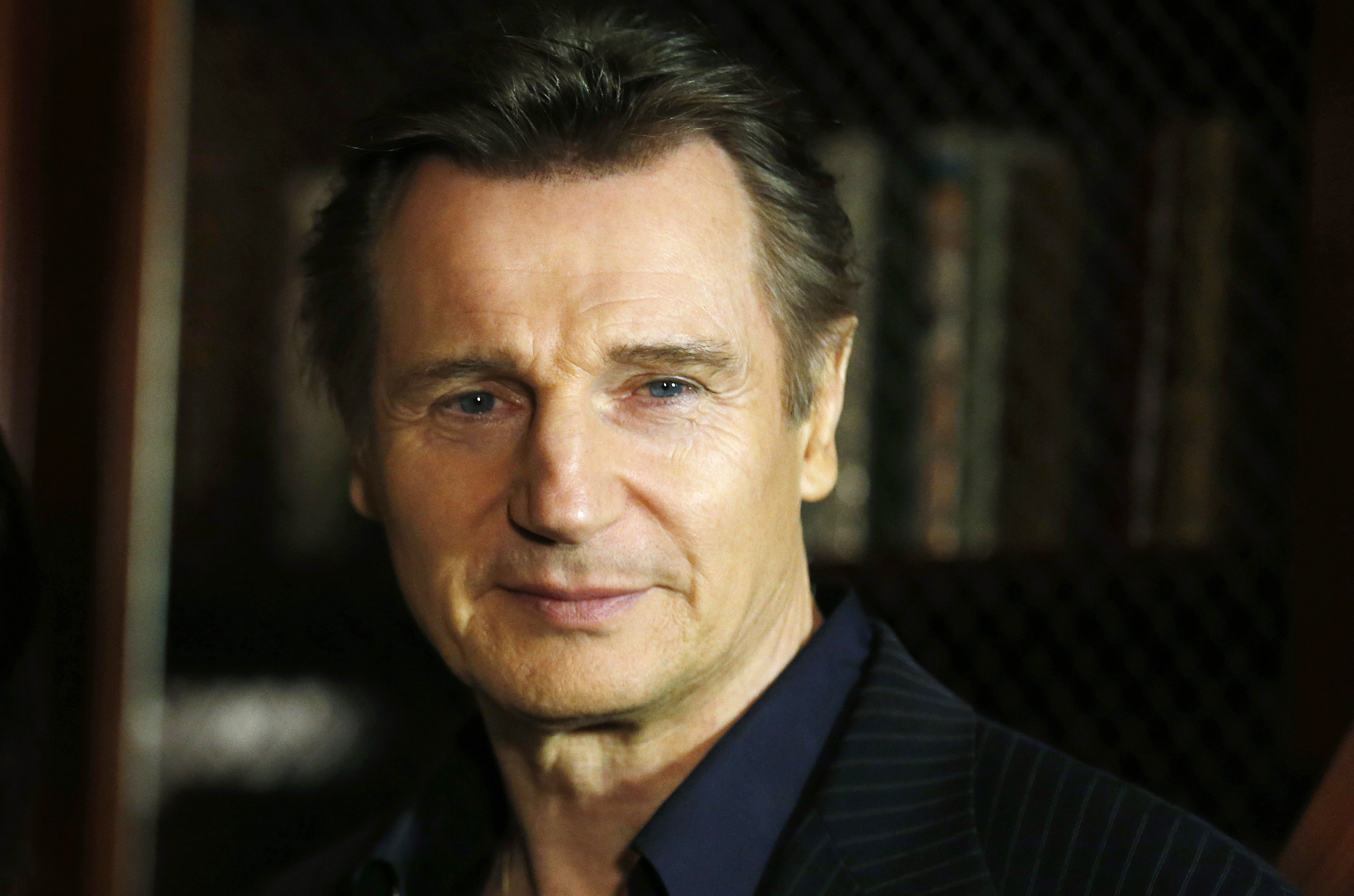 Cast member Liam Neeson  poses during a media event to promote the film "Non-Stop", in London