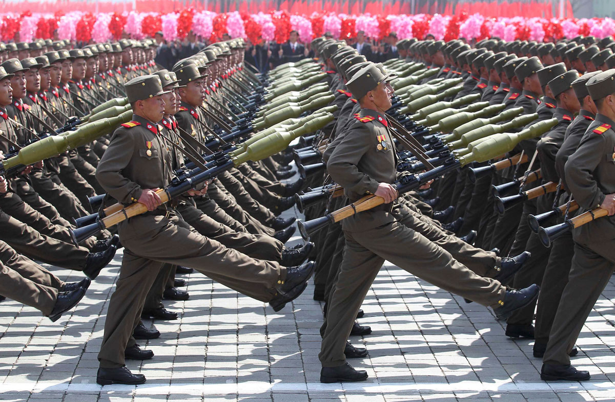 Soldiers march past the podium during a military parade to celebrate the centenary of the birth of DPRK's founder Kim Il-sung in Pyongyang