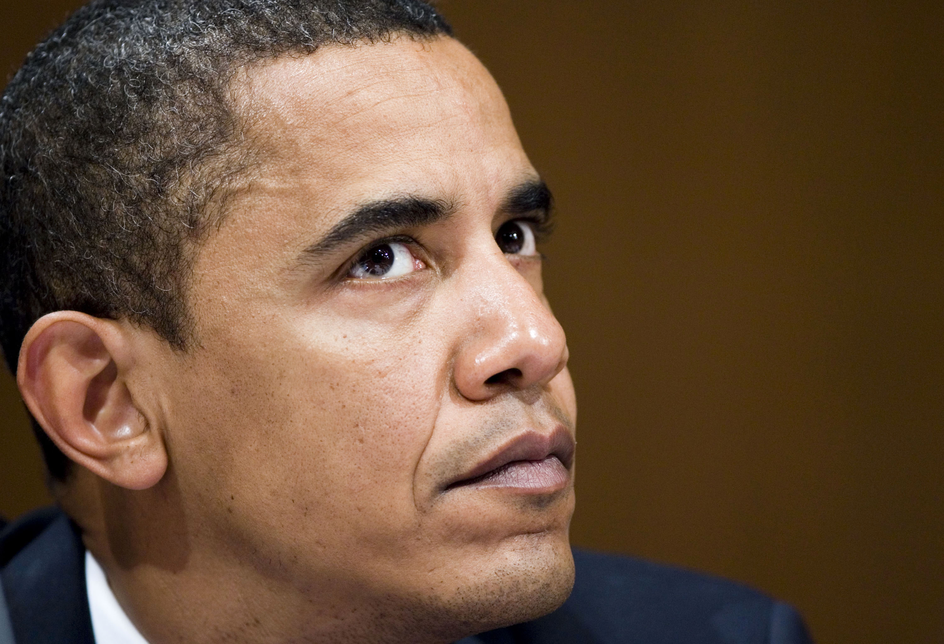 Democratic presidential candidate Obama listens to testimony from US Commander in Iraq General Petraeus in Washington