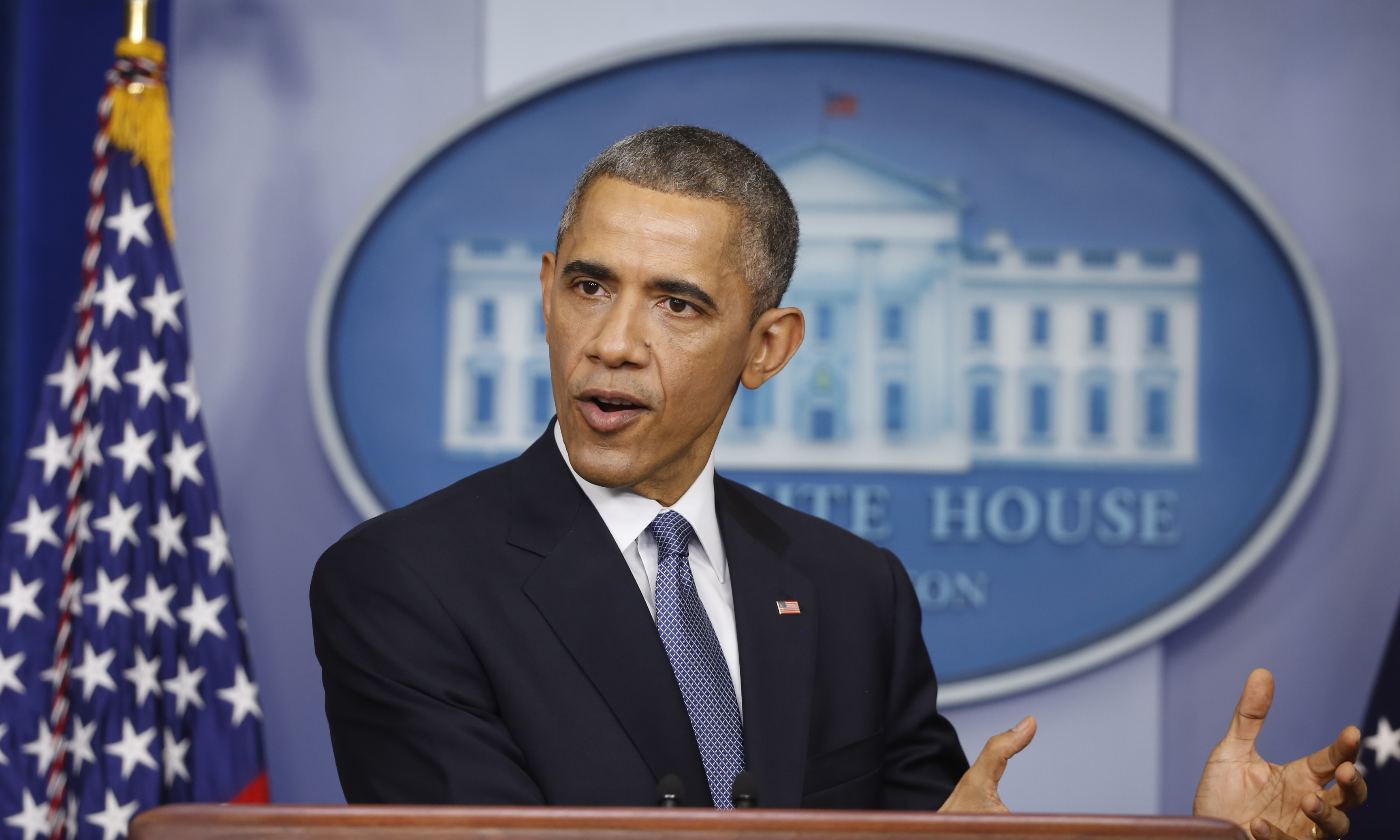 U.S. President Obama answers a question about the administration's new policy on Cuba after his end of the year press conference in the briefing room of the White House in Washington