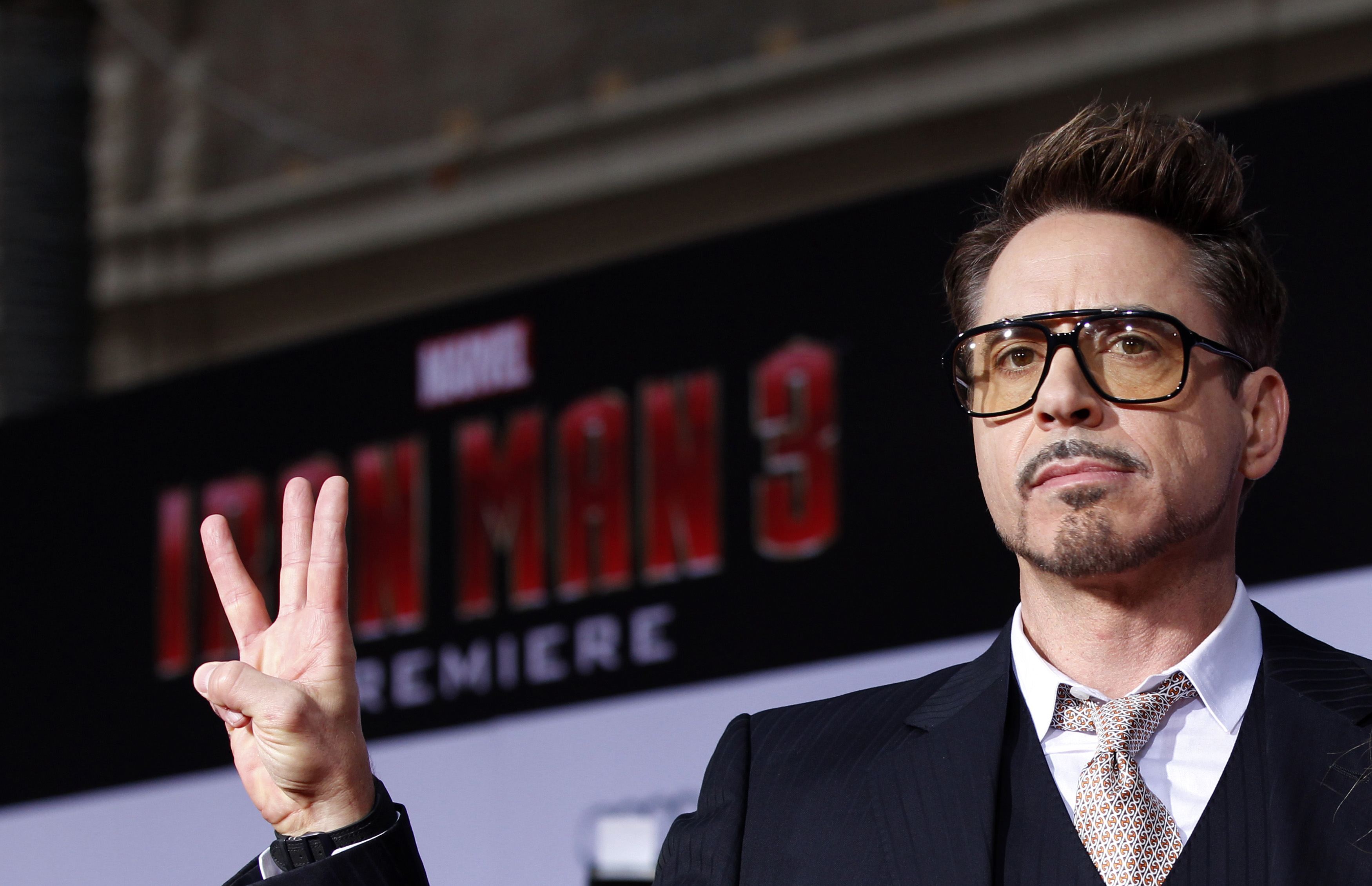 Cast member Robert Downey Jr. poses at the premiere of "Iron Man 3" in Hollywood