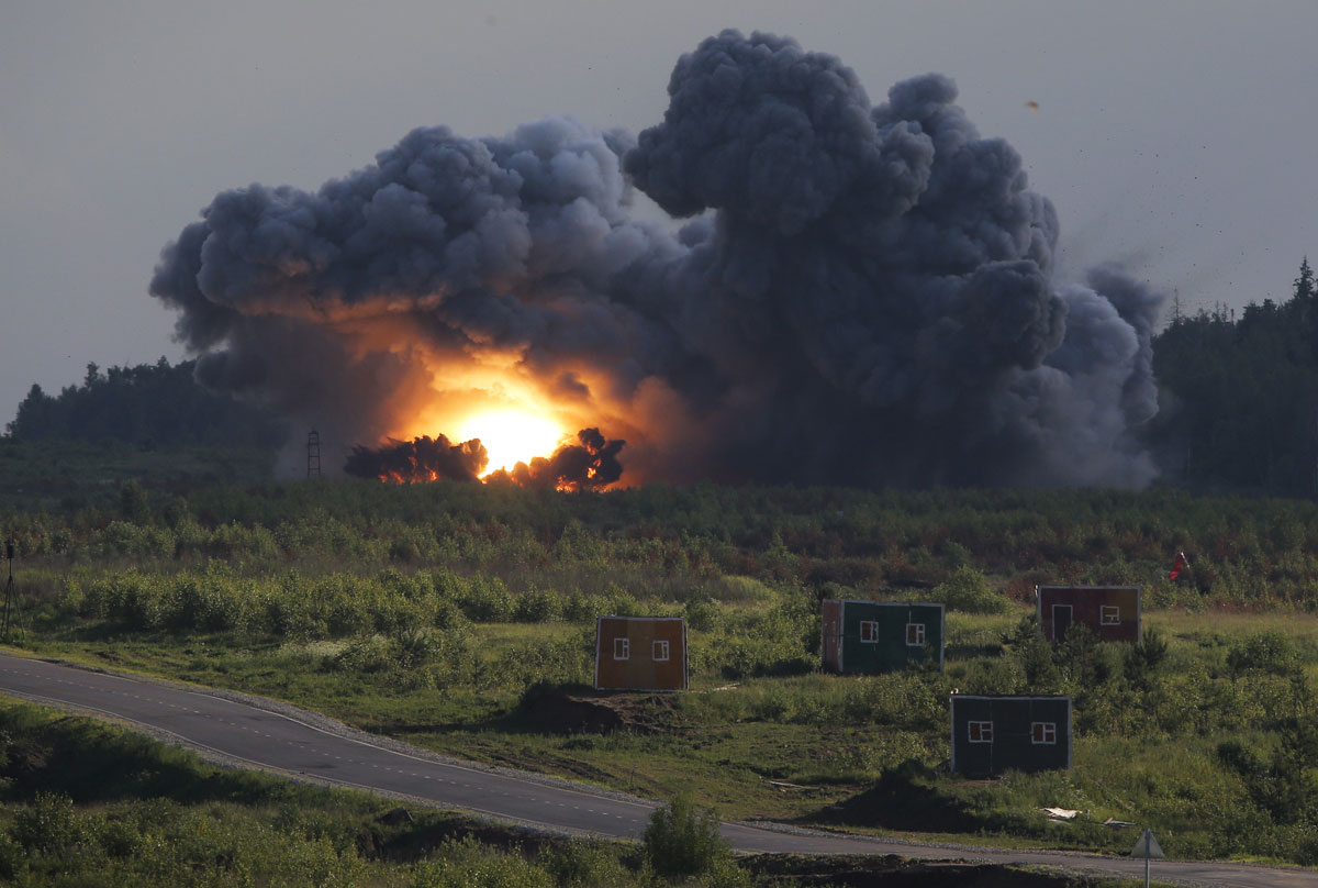 A rocket explodes on target during the opening of the Army-2015 international military forum in Kubinka 