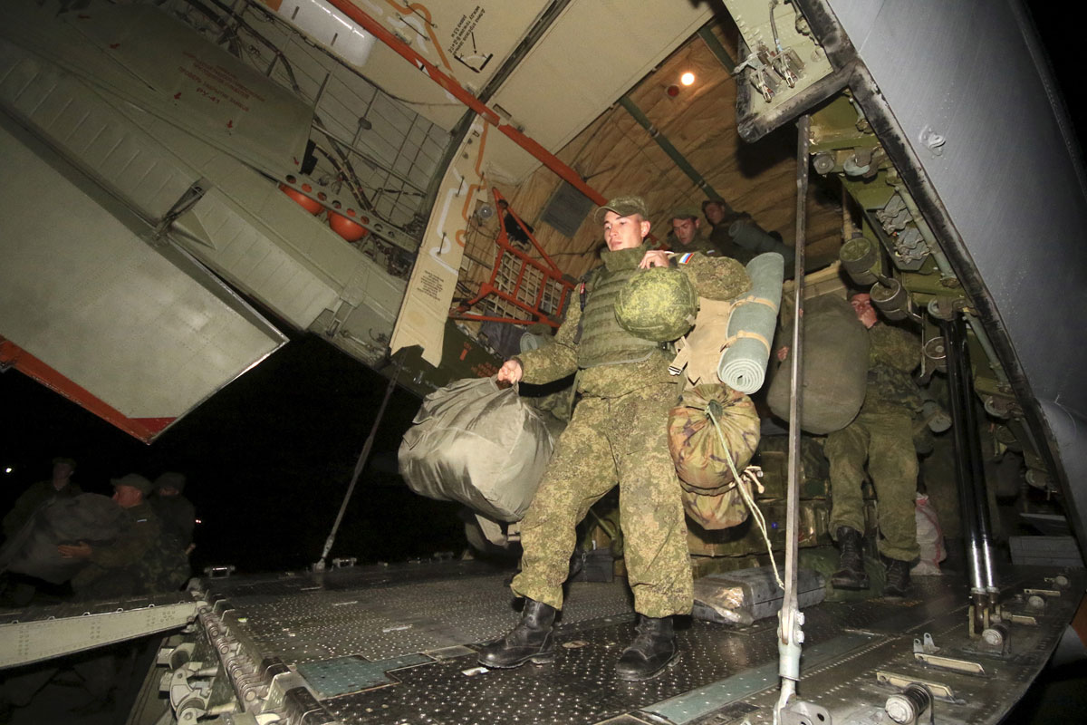 Russian marines who guarded Russia's Hmeymim air base in Syria arrive at Belbek military airport near Crimean port of Sevastopol