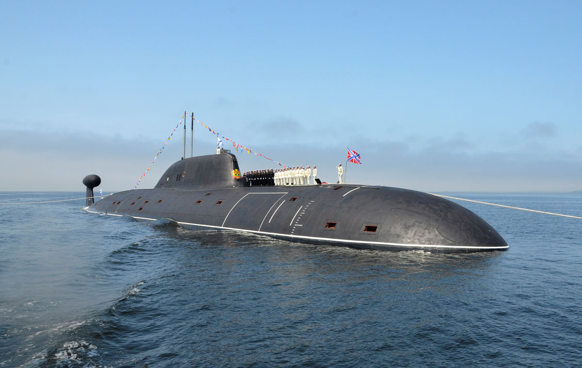 A crew lines up on the Kuzbass nuclear submarine during a rehearsal for the Navy Day parade in the far eastern port of Vladivostok, Russia