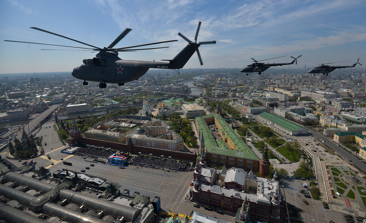 Russian Mil Mi-26 Halo helicopter flies over the Red Square during the Victory Day parade in Moscow