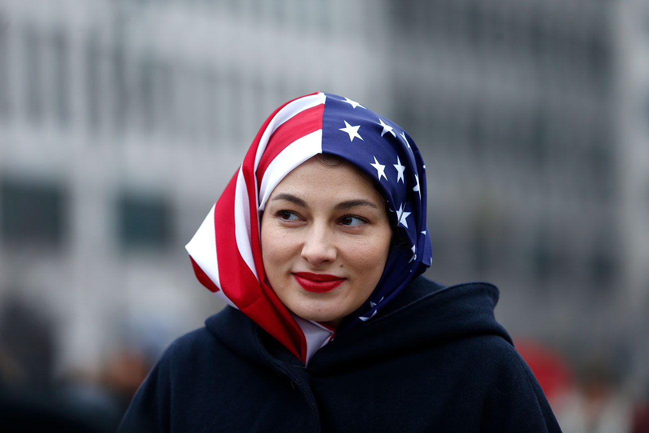 People gather in front of the U.S. Embassy on Pariser Platz in solidarity with women's march in Washington and many other marches in several countries, in Berlin