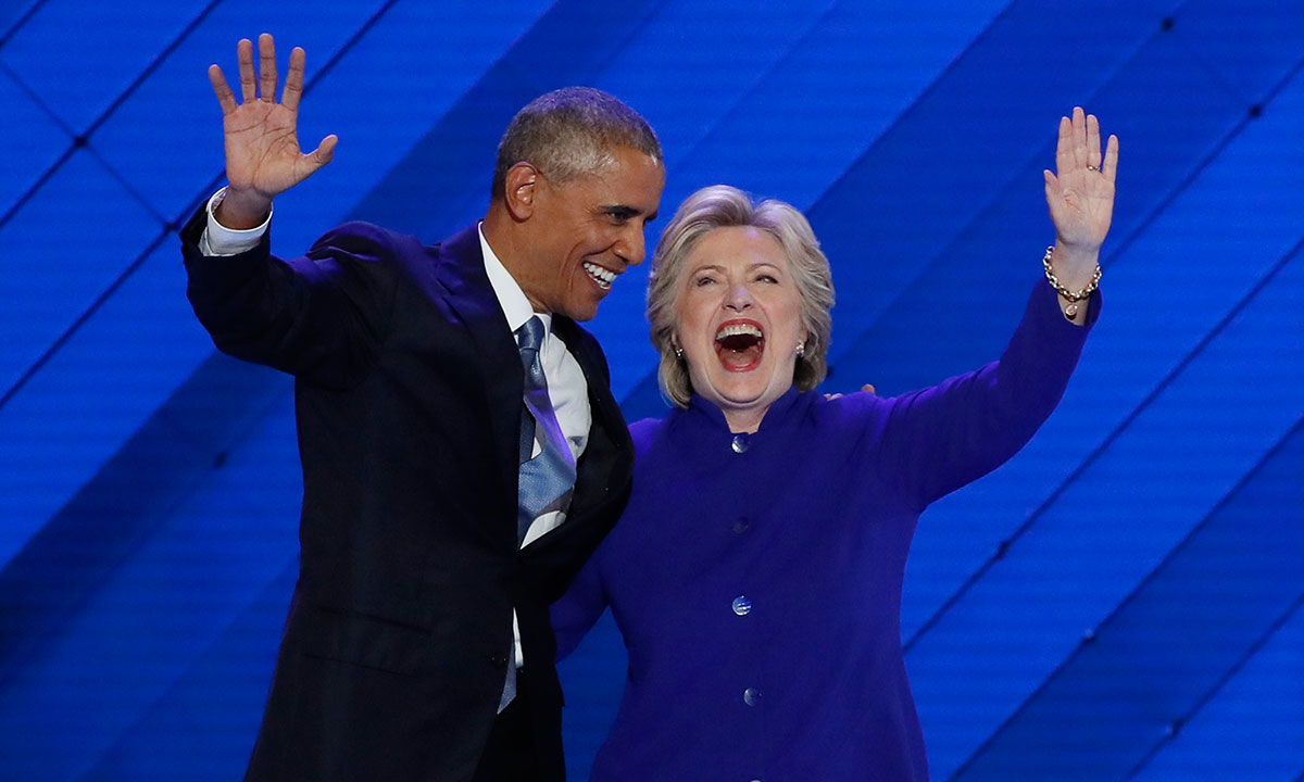 U.S. President Obama and Democratic presidential nominee Clinton appear onstage together after his speech on the third night at the Democratic National Convention in Philadelphia