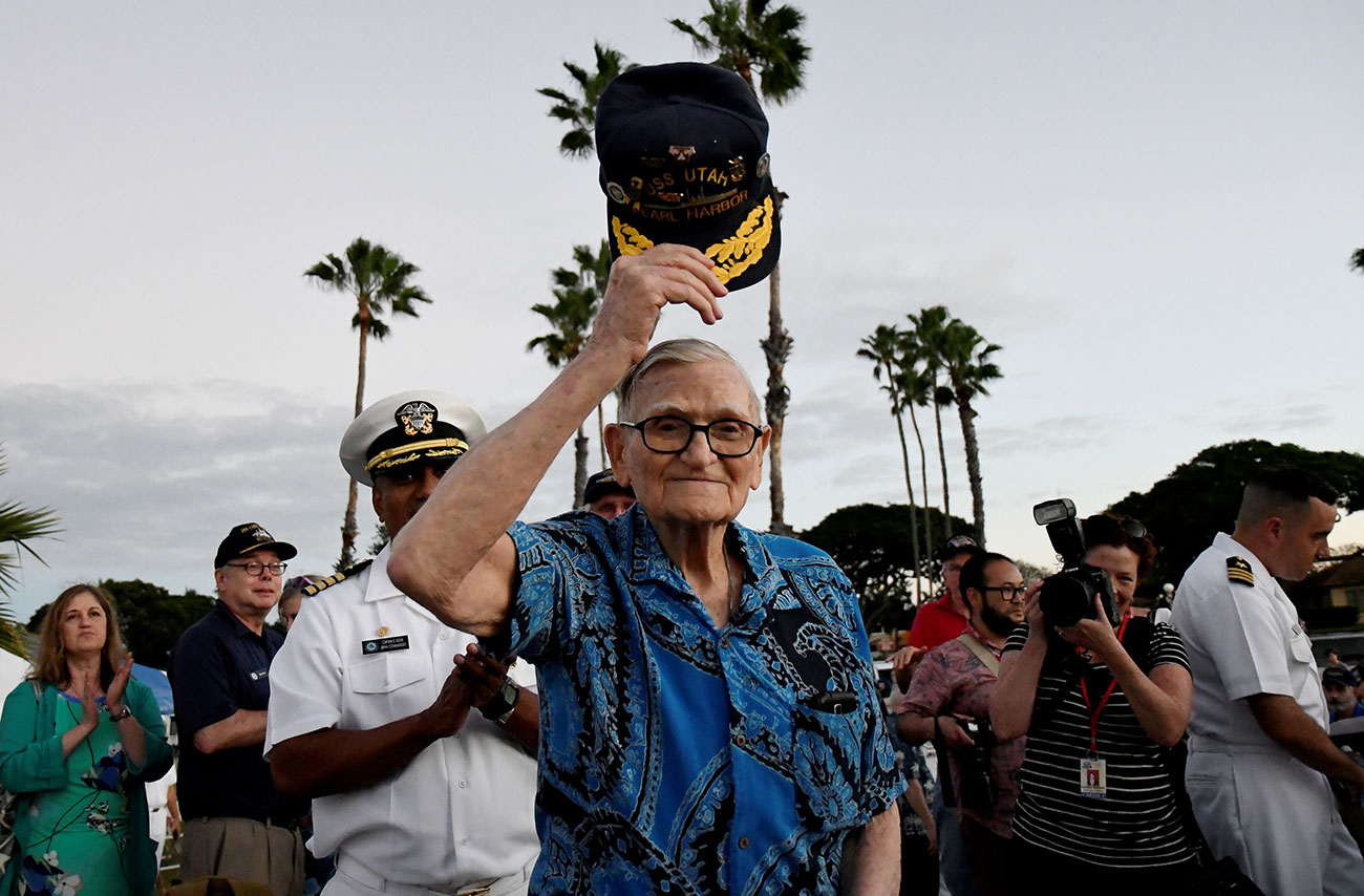 Pearl Harbor survivor Bill Hughes, who was aboard the USS Utah when it was attacked, arrives at a ceremony honoring the sailors of the USS Utah at the memorial on Ford Island at Pearl Harbor in Honolulu, Hawaii