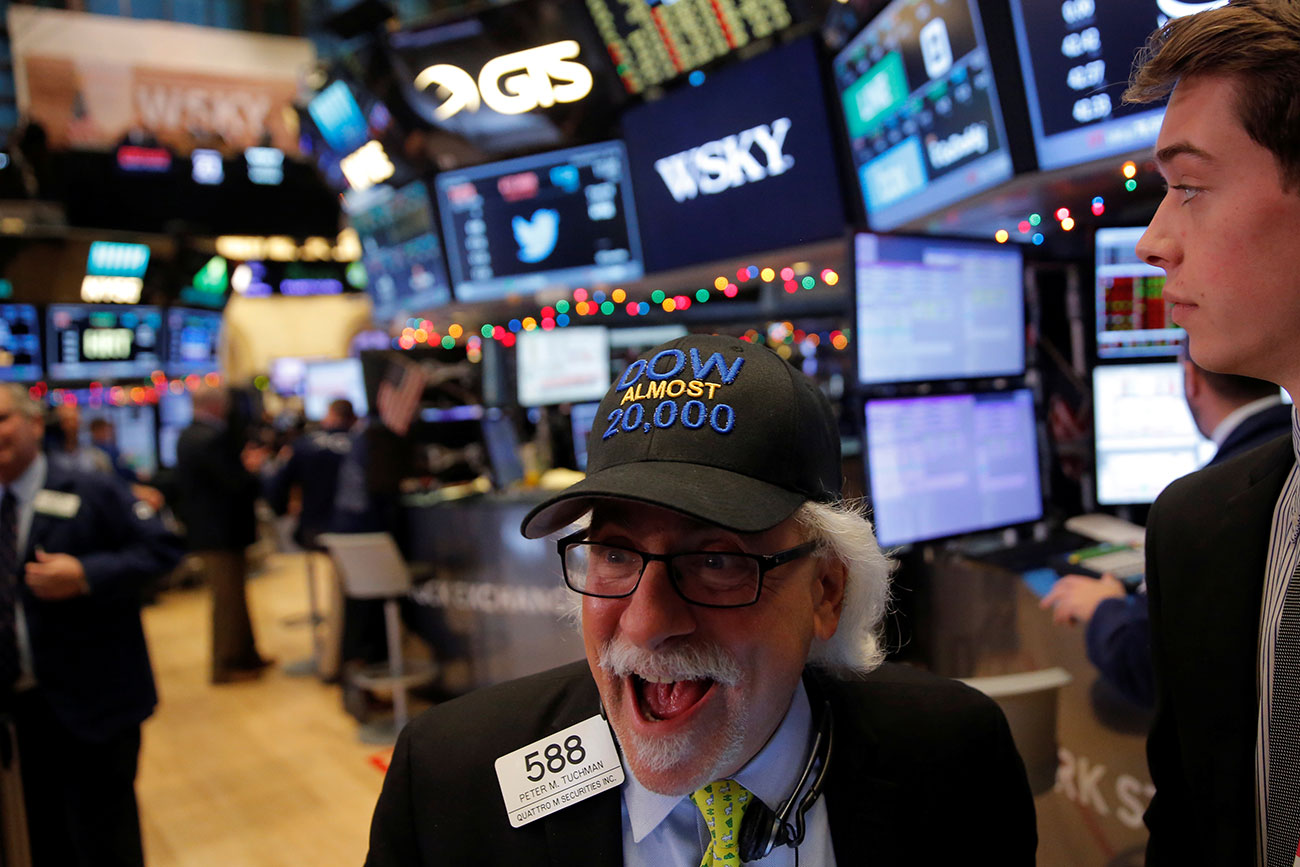 Trader Peter Tuchman works on the floor at the New York Stock Exchange (NYSE) in Manhattan, New York City, U.S.