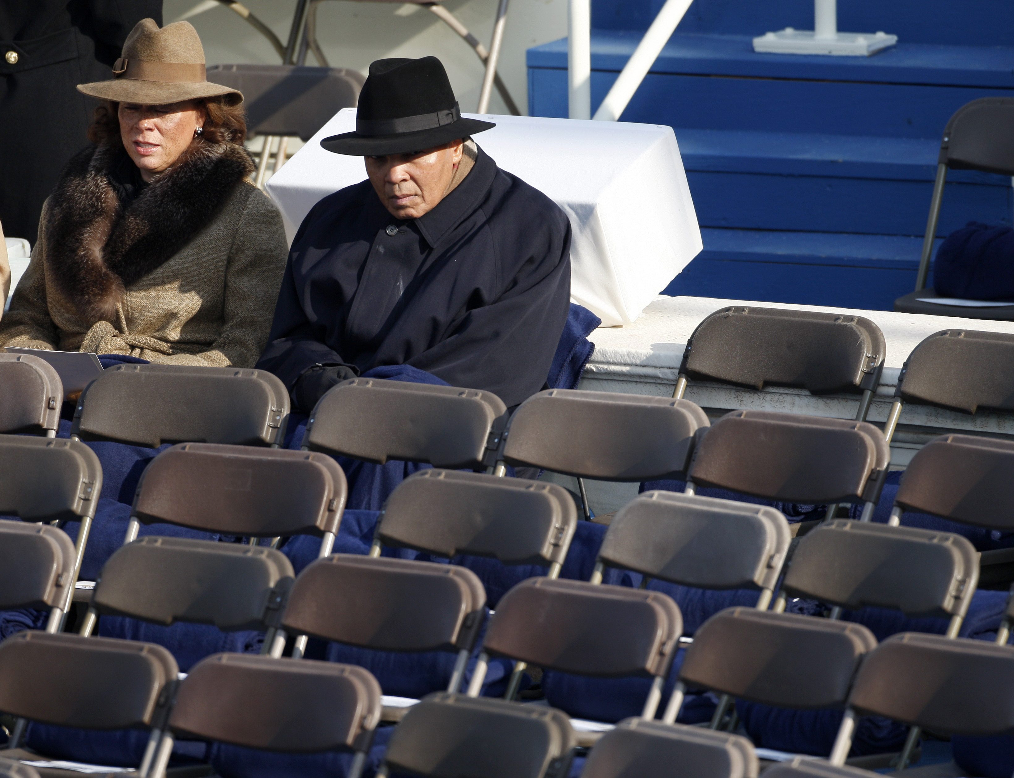 Muhammad Ali sits with his wife Yolanda as they await the inauguration ceremony of Barack Obama as the 44th President of the US in Washington