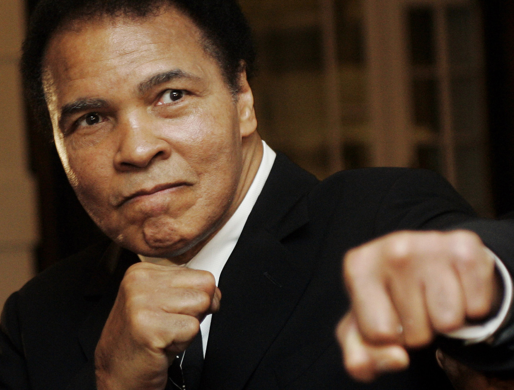 U.S. boxing great Muhammad Ali poses at the World Economic Forum in Davos