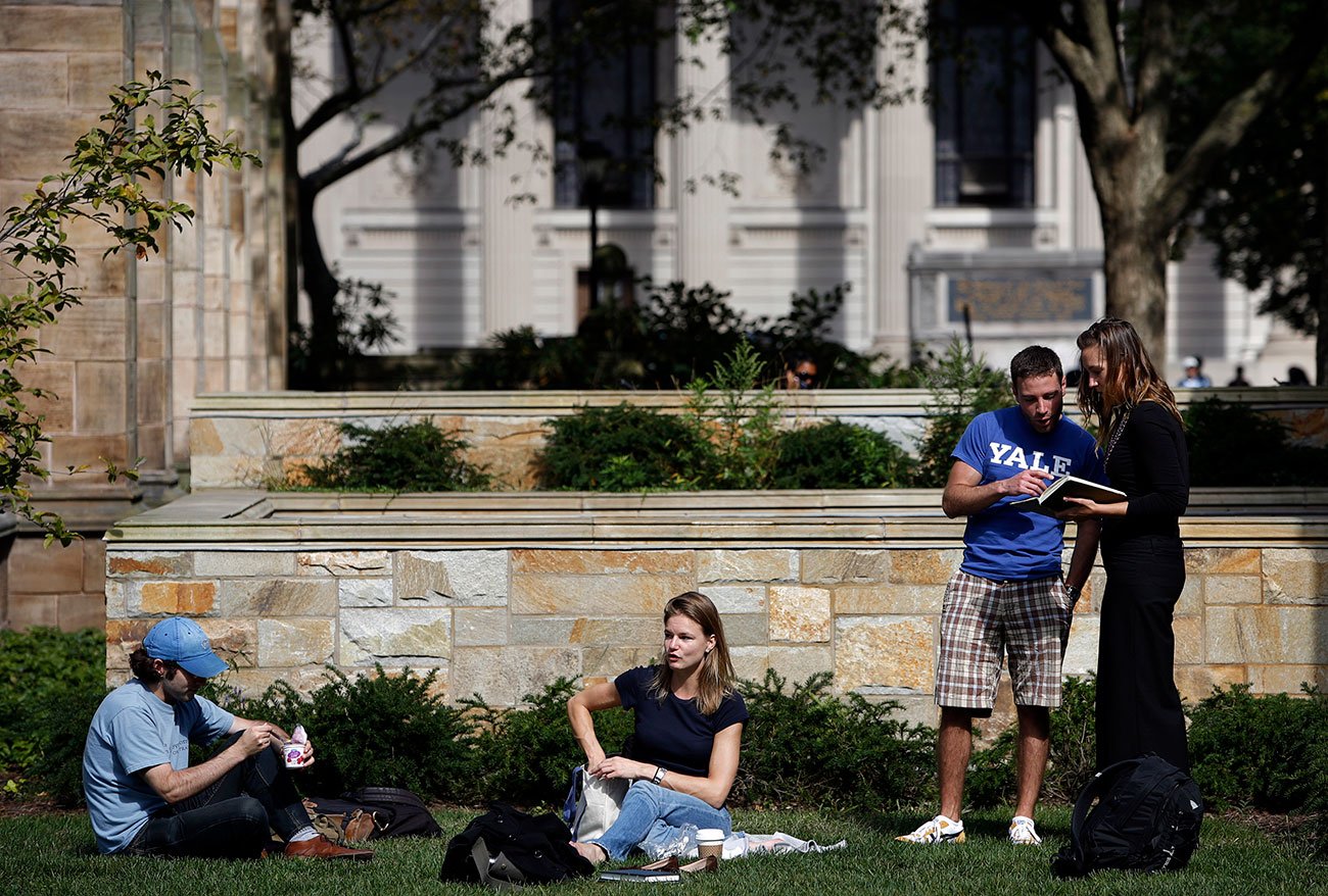 Students gather on the campus of Yale University in New Haven, Connecticut