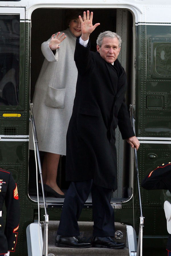 		<p>Former U.S. President George W. Bush and former first lady Laura Bush wave before departing the U.S. Capitol by helicopter after the inauguration of Barack Obama as the 44th President of the United States of America on the West Front of the Capitol i