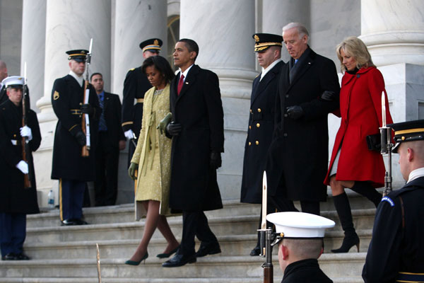 		<p>U.S. President Barack Obama and his wife Michelle walks down the stairs of the U.S. Capitol with Vice President Joe Biden and his wife Jill Biden after the inauguration of the 44th president of the United States of America in Washington January 20, 2