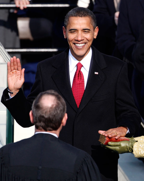 		<p>Barack Obama takes the Oath of Office as the 44th President of the United States as he is sworn in by U.S. Chief Justice John Roberts with his wife Michelle by his side during the inauguration ceremony in Washington, January 20, 2009. Obama became th