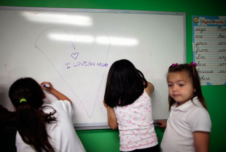 Children attend an after-school class at the Hope Gardens Family Center.