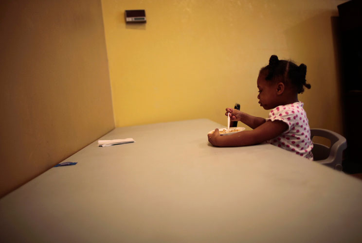 Aleyah Lloyd, 3, eats lunch.