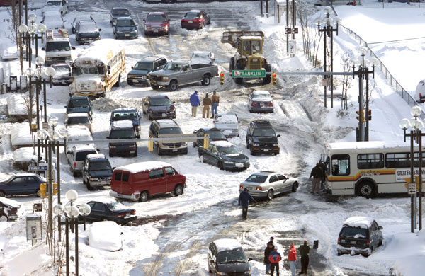 Court Street at Niagara Square in downtown Buffalo, New York is blocked by grid-lock from abandoned vehicles November 21, 2000. Thousands were stranded, including students in their schools. A classic lake-effect snow storm dumped over two feet in blizzard