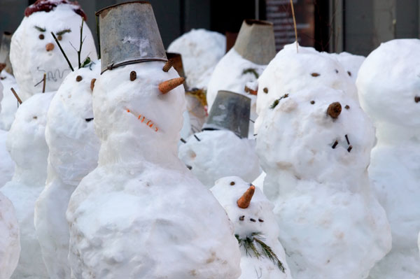 		<p>Don't worry, you're not in Dr. Who. These snowmen are harmless as snow continues to fall on the northeast.</p>