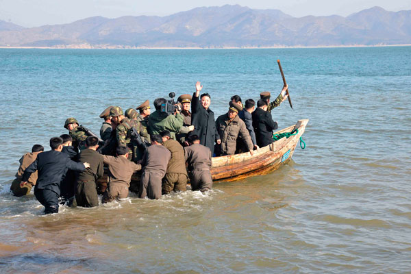 		<p>Kim Jong-Un in a boat during his visit to the Wolnae Islet Defence Detachment in the western sector of the front line, which is near Baengnyeong Island of South Korea March 11, 2013. South Korea and U.S. forces are conducting large-scale military dri