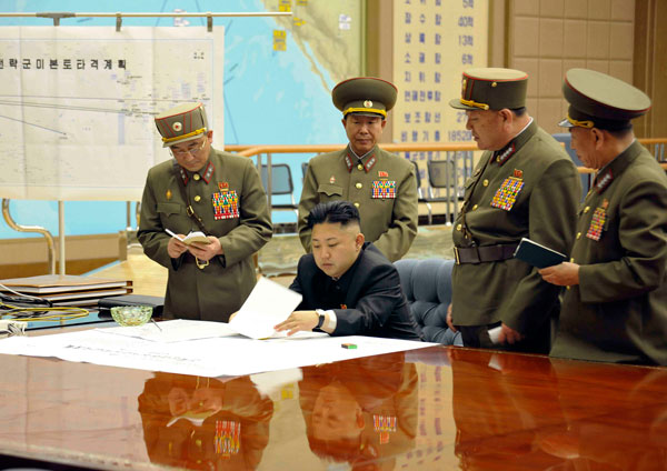 		<p>Kim Jong-un presides over an urgent operation meeting on the Korean People's Army Strategic Rocket Force's performance of duty for firepower strike at the Supreme Command in Pyongyang, early March 29, 2013. North Korea put its rocket units on standby