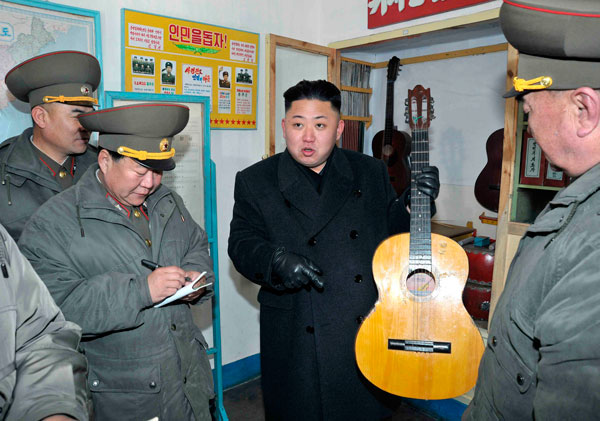 		<p>North Korean leader Kim Jong-Un holds a guitar during his visit to a military unit on the Wolnae Islet Defence Detachment in the western sector of the front line, which is near Baengnyeong Island of South Korea March 11, 2013 in this picture released