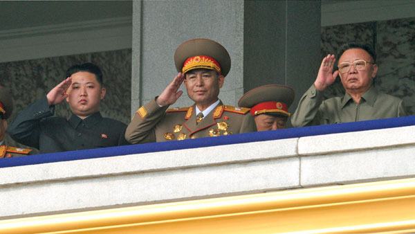 		<p>North Korean leader Kim Jong-il and his youngest son Kim Jong-un salute next to a military official during a parade to commemorate the 65th anniversary of the founding of the Workers' Party of Korea in Pyongyang October 10, 2010.</p>