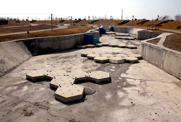 The deserted and unmaintained former venue for the kayaking competition of the 2008 Beijing Olympic Games, can be seen on the outskirts of Beijing March 27, 2012. The gigantic infrastructures built for the Beijing Olympics, namely the "Bird's Nest", and t