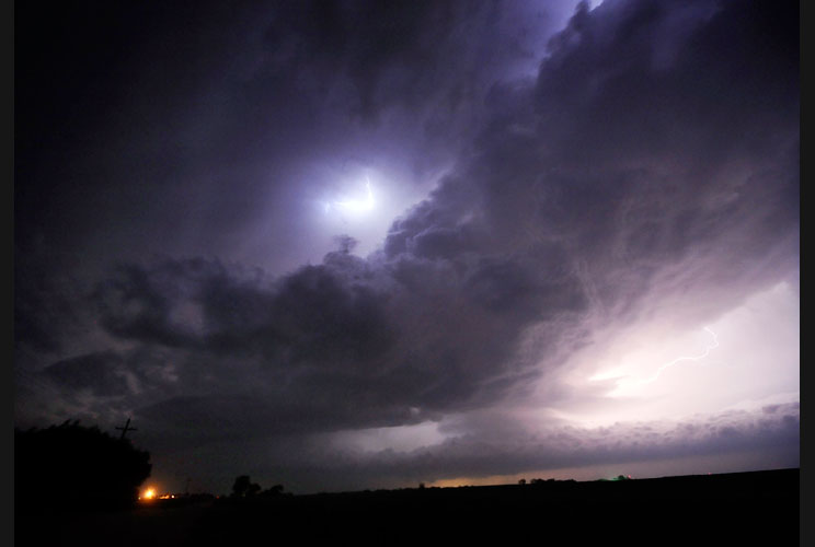 A huge tornadic supercell lights up the night skies over Salina, Kansas, on April 14.