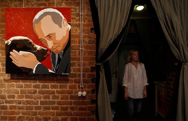 		<p>In this classic Photoshop "stamp" style, we see Putin not just as a politician but as a man with a heart, and a dog.</p>