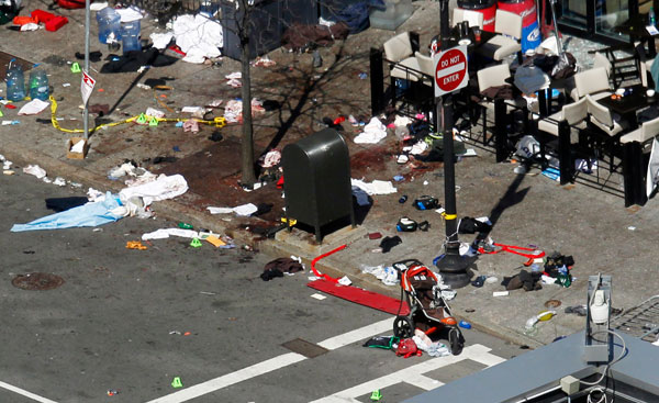 		<p>Blood and debris are seen on the sidewalk along Boylston Street a day after two explosions hit the Boston Marathon in Boston, Massachusetts April 16, 2013. Two bombs packed with ball bearings tore through crowds near the finish line of the Boston Mar