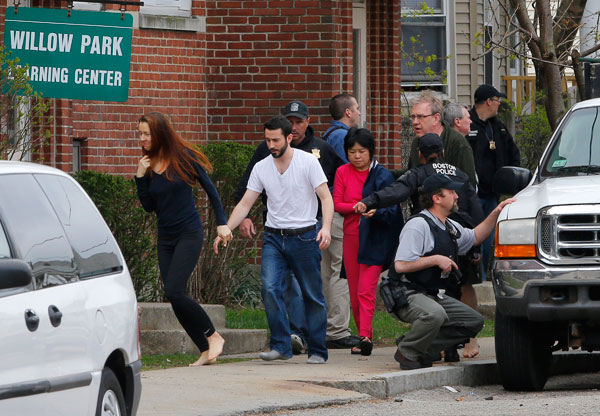 		<p>Residents are evacuated as FBI agents search homes for the Boston Marathon bombing suspects in Watertown, Massachusetts April 19, 2013. Police on Friday killed one suspect in the Boston Marathon bombing during a shootout and mounted a house-to-house 